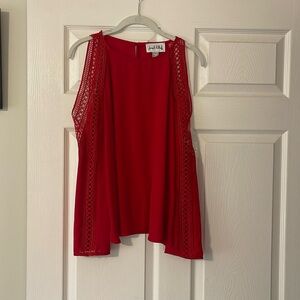 Joseph Ribkoff
Red long sleeveve shirt with cutout